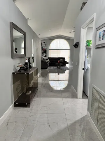 a living room with a couch and a table