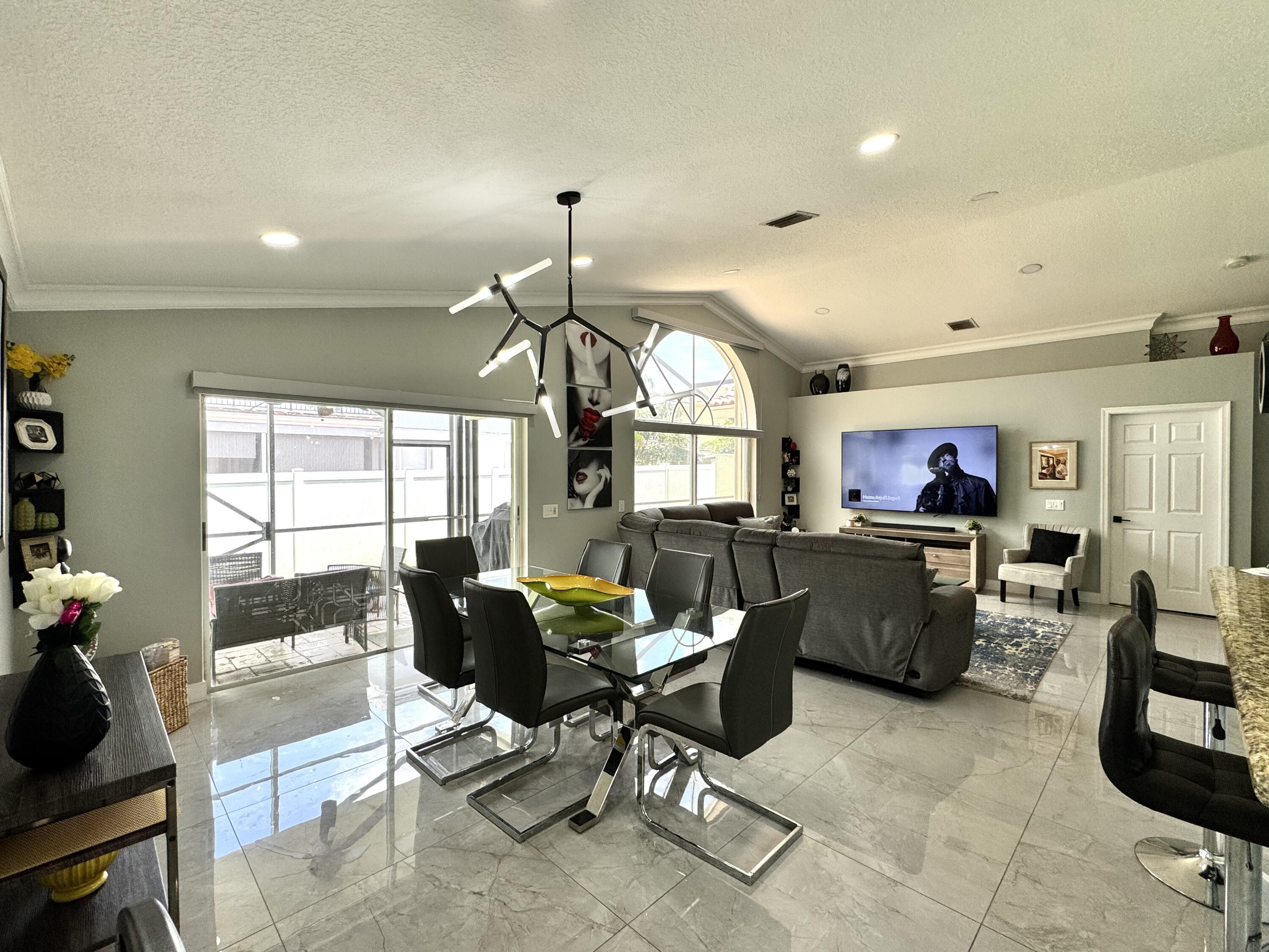 18038 Rhumba Way Boca Raton, FL 33496 - Photo 13 of 39 a view of a workspace with furniture and a livingroom
