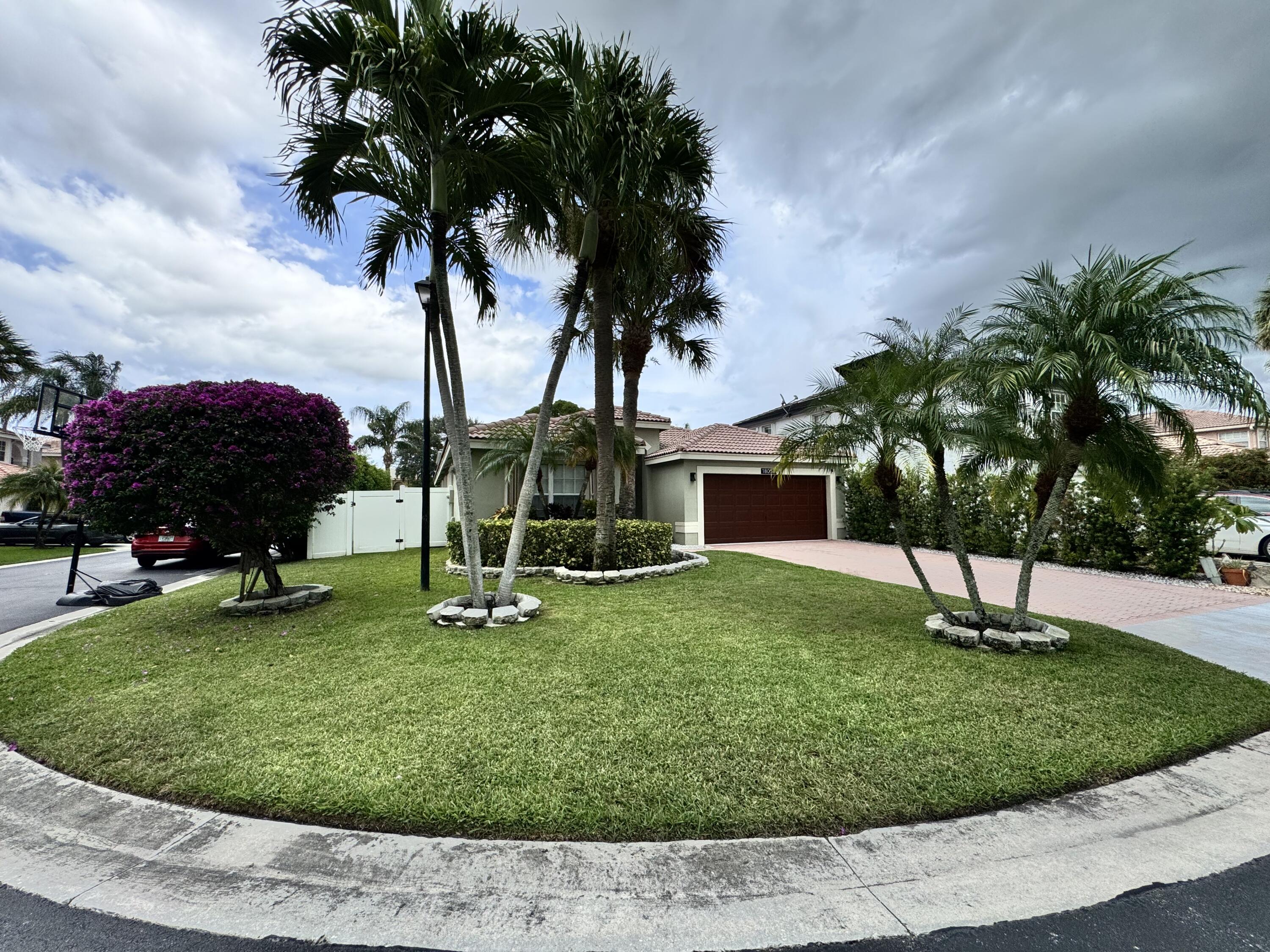 18038 Rhumba Way Boca Raton, FL 33496 - Photo 2 of 39 a park with full of palm trees