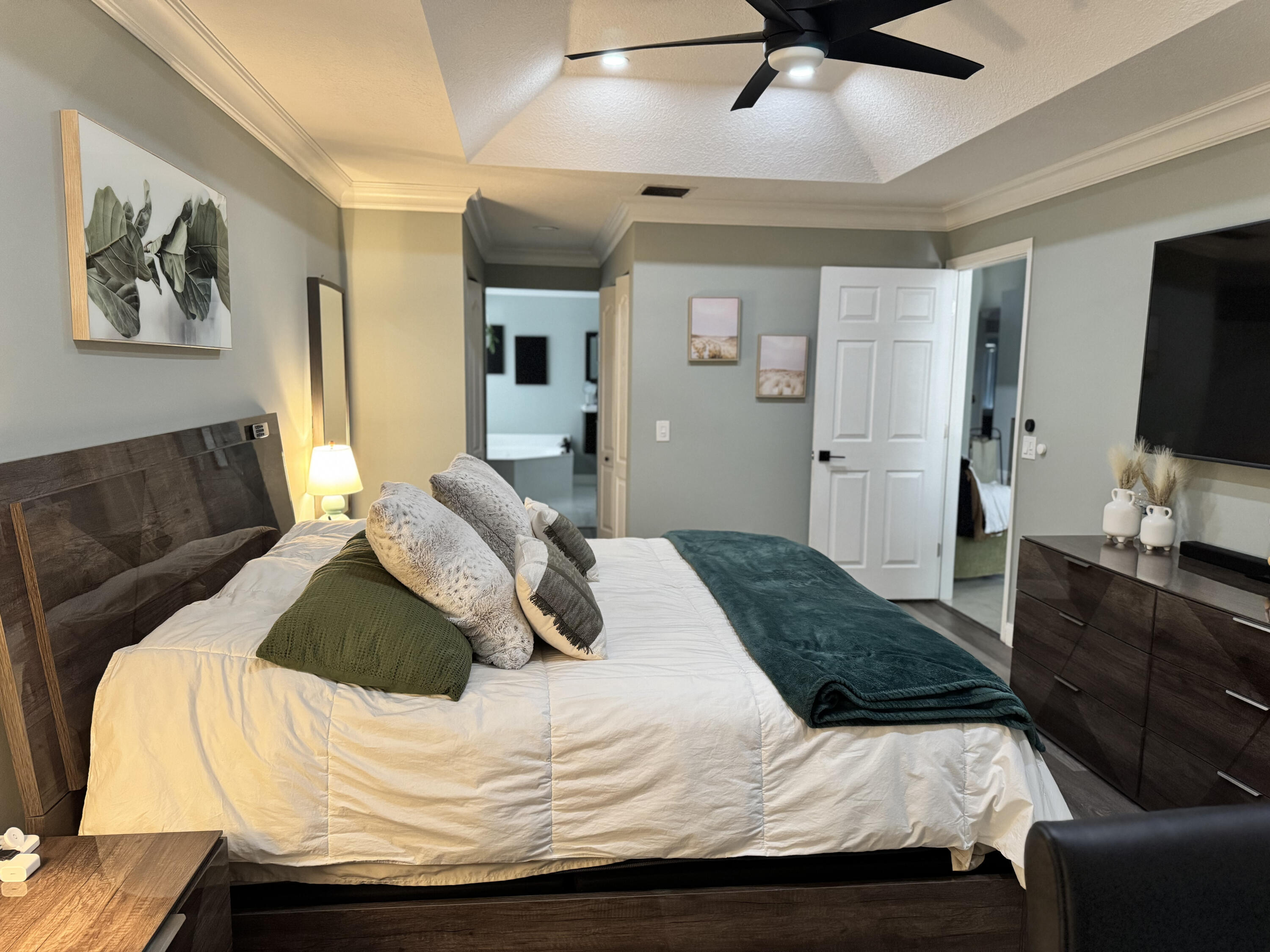 18038 Rhumba Way Boca Raton, FL 33496 - Photo 23 of 39 a bedroom with a bed and a television