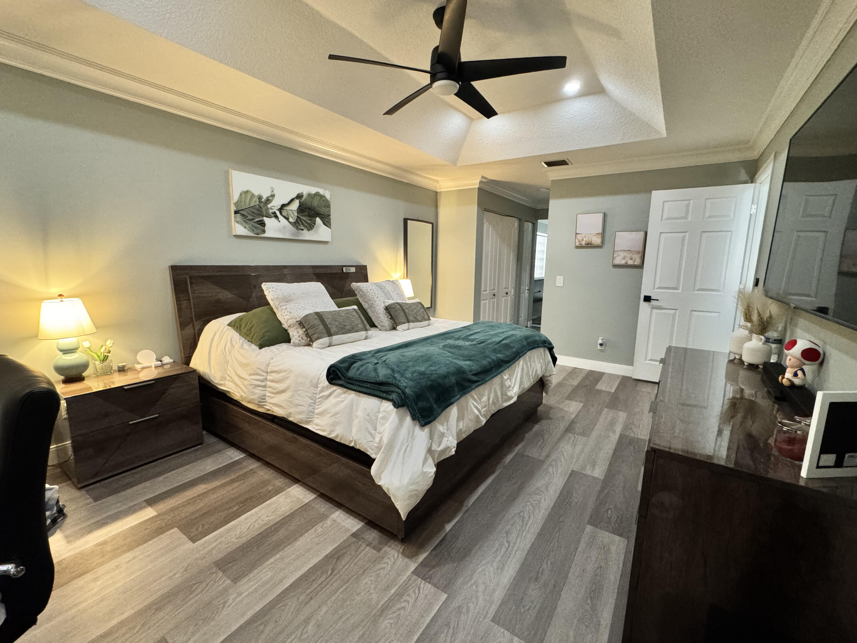 18038 Rhumba Way Boca Raton, FL 33496 - Photo 24 of 39 a bedroom with a bed and a mirror