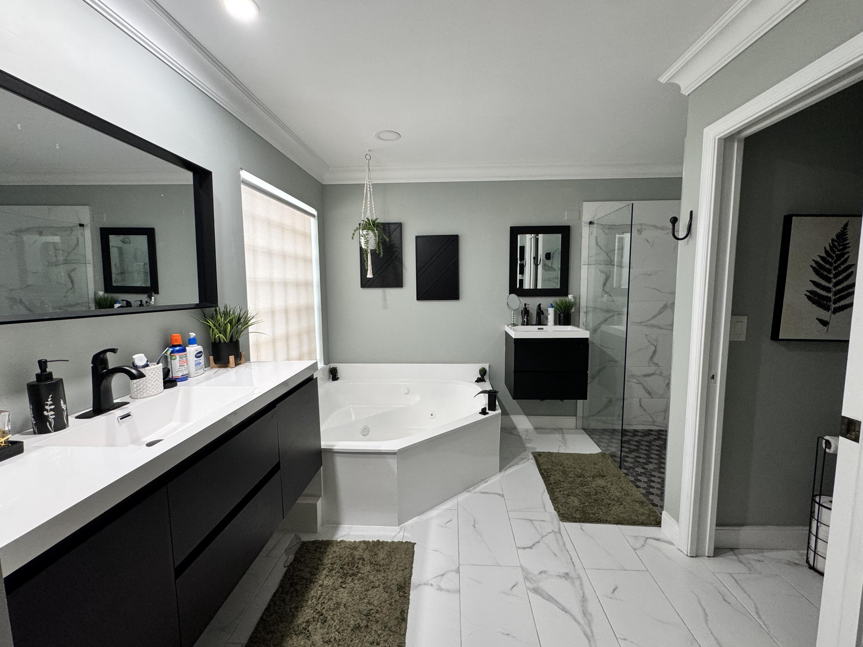 18038 Rhumba Way Boca Raton, FL 33496 - Photo 26 of 39 a bathroom with a tub sink and mirror