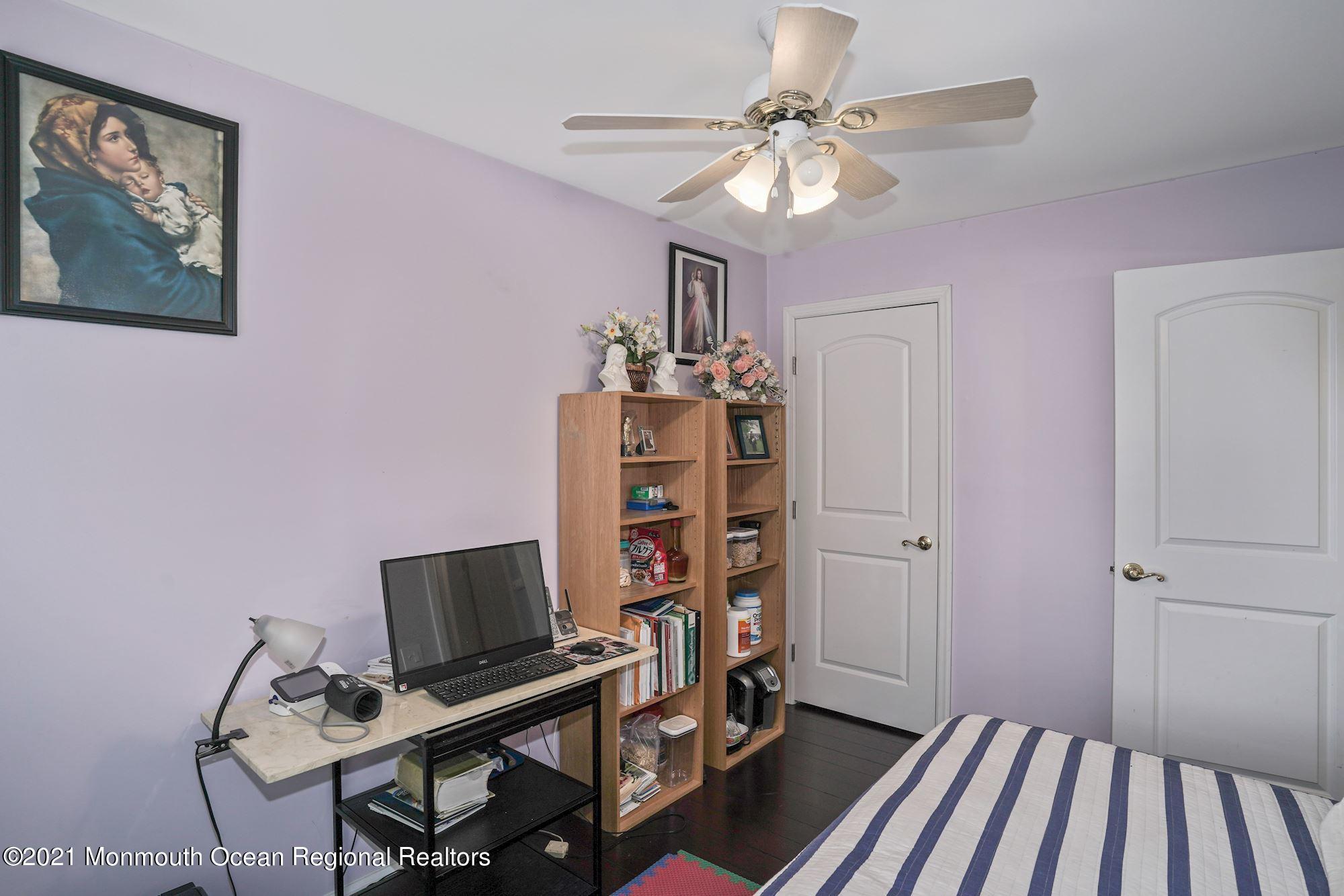 657 Drum Point Road Brick, NJ 08723 - Photo 15 of 25 a view of a workspace with furniture and a window
