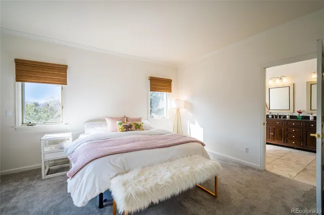 a bathroom with a sink a toilet and bathtub