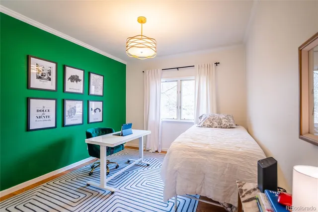 a bathroom with a sink a toilet and shower curtain
