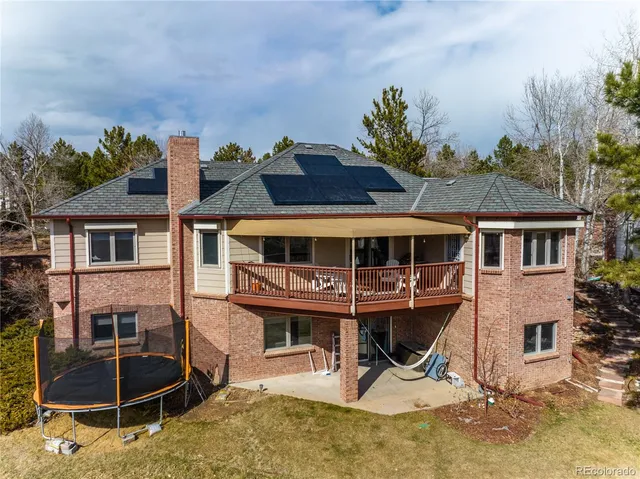 an aerial view of house with yard