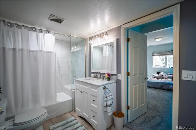 a room with furniture and a wooden floor