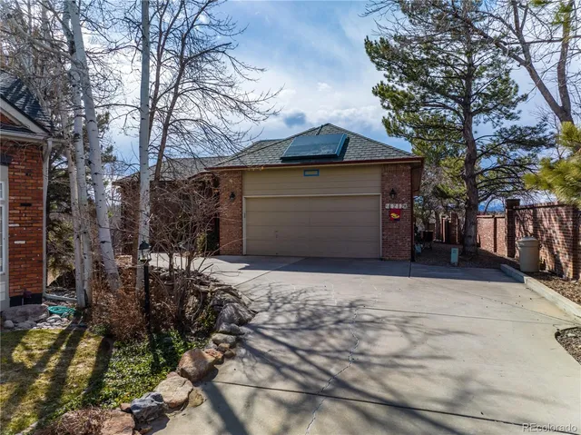 an aerial view of a house with a swimming pool