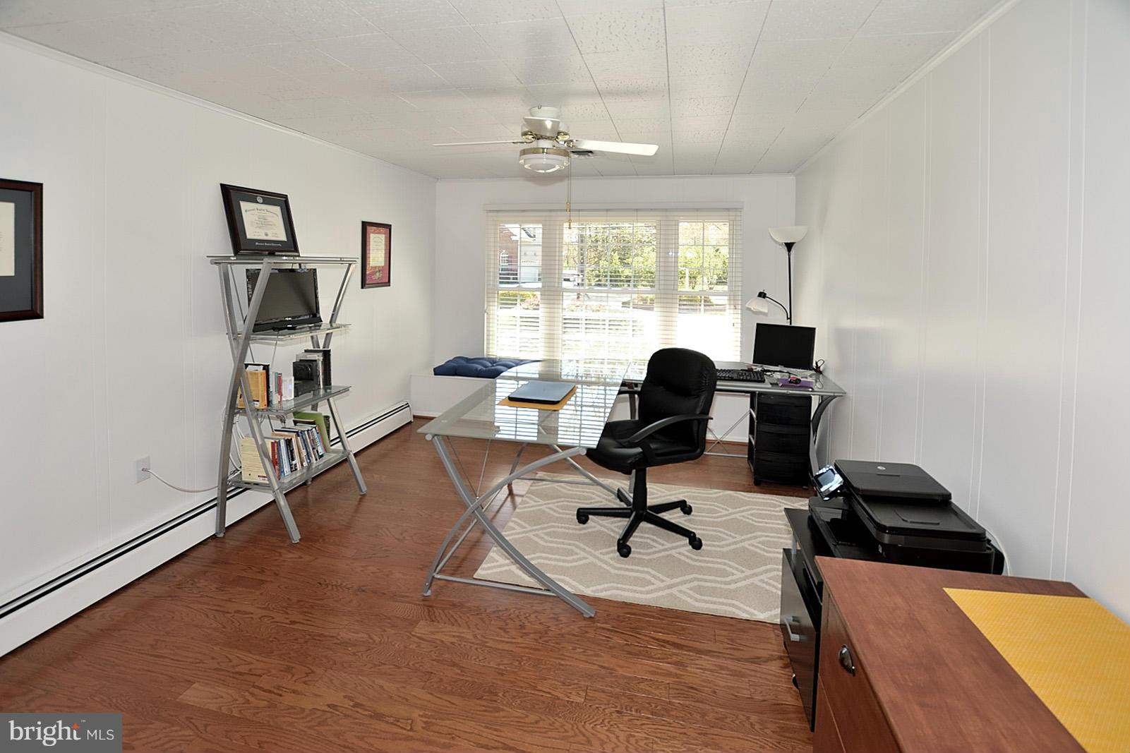 4902 Pole Road Alexandria, VA 22309 - Photo 12 of 30 a view of a workspace with furniture and a window