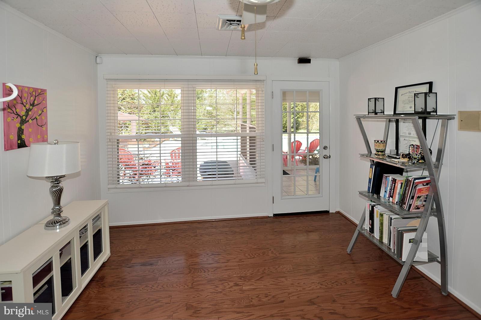 4902 Pole Road Alexandria, VA 22309 - Photo 13 of 30 a view of an empty room with working space and a window