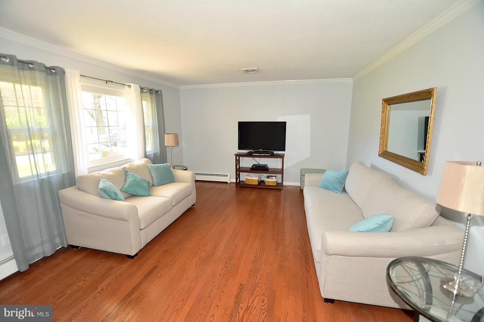 4902 Pole Road Alexandria, VA 22309 - Photo 3 of 30 a living room with furniture and a flat screen tv