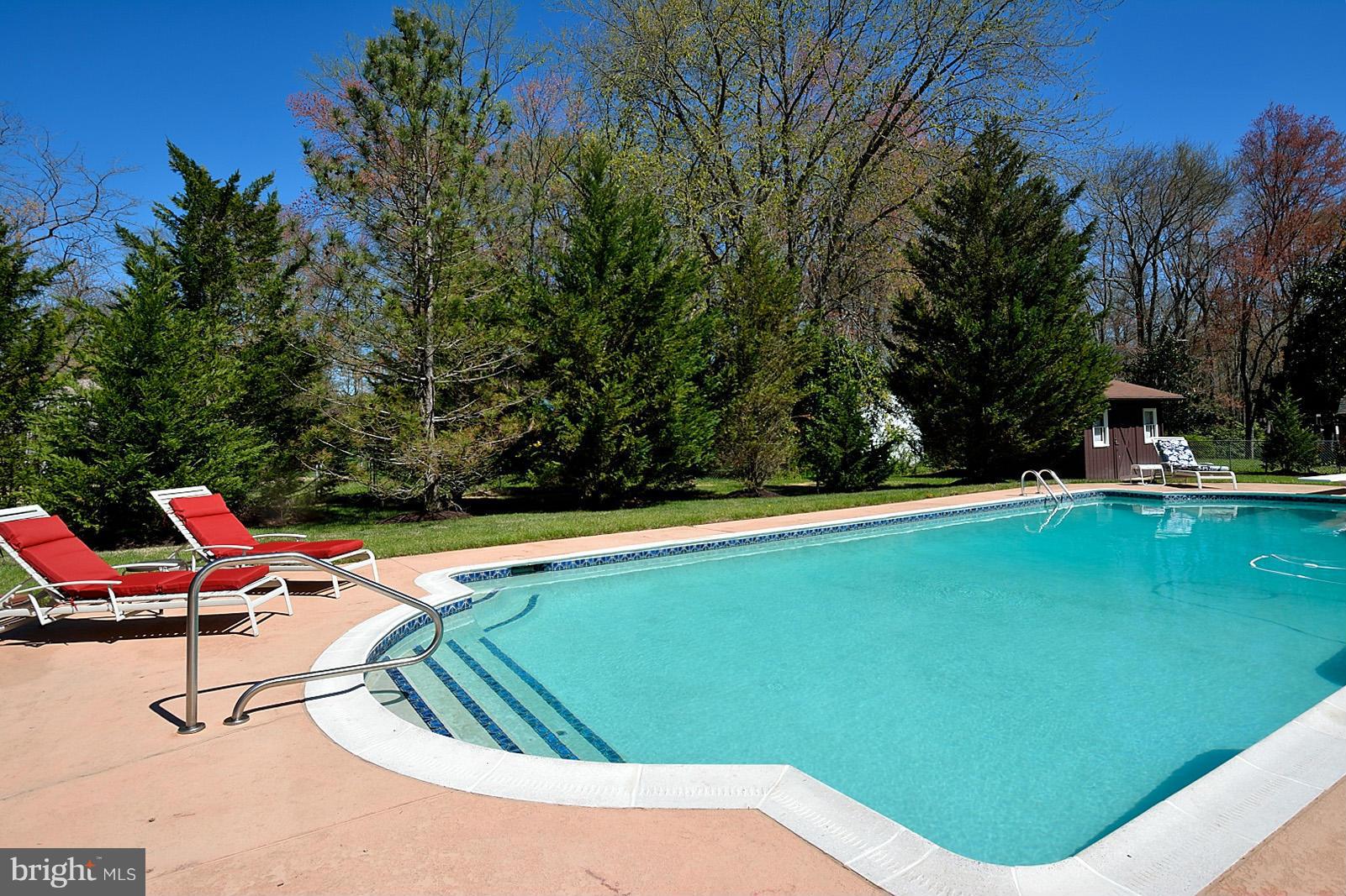 4902 Pole Road Alexandria, VA 22309 - Photo 24 of 30 a view of swimming pool from a lounge chair