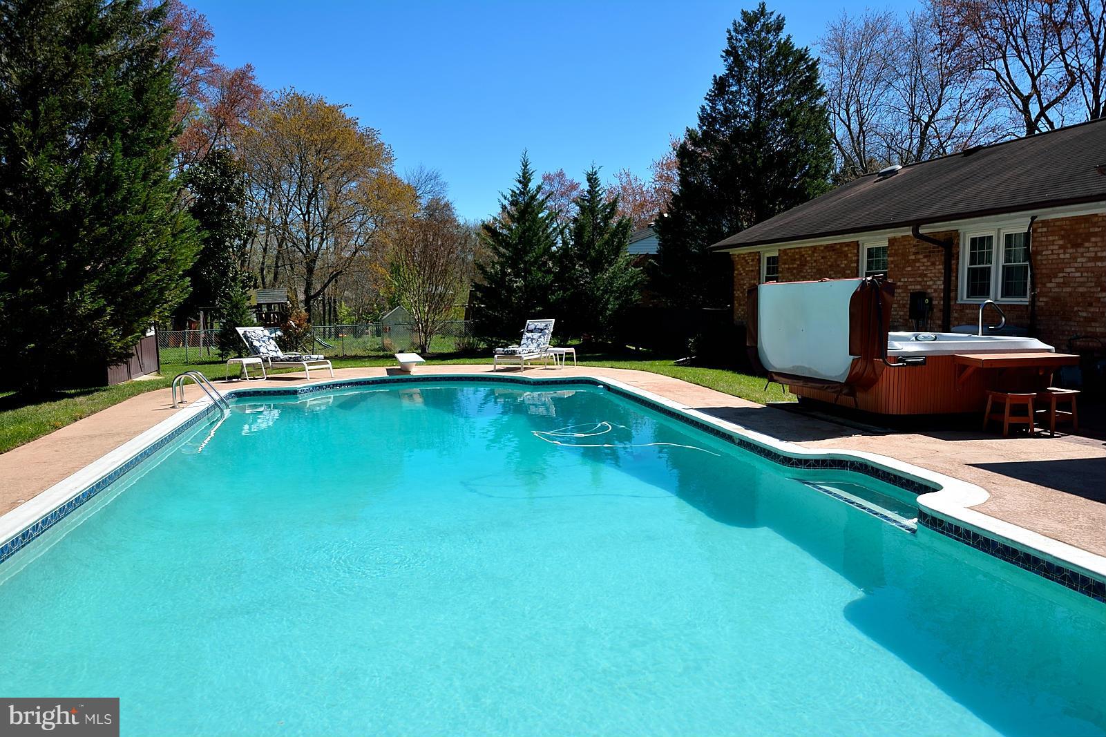 4902 Pole Road Alexandria, VA 22309 - Photo 25 of 30 a view of a house with swimming pool and sitting area