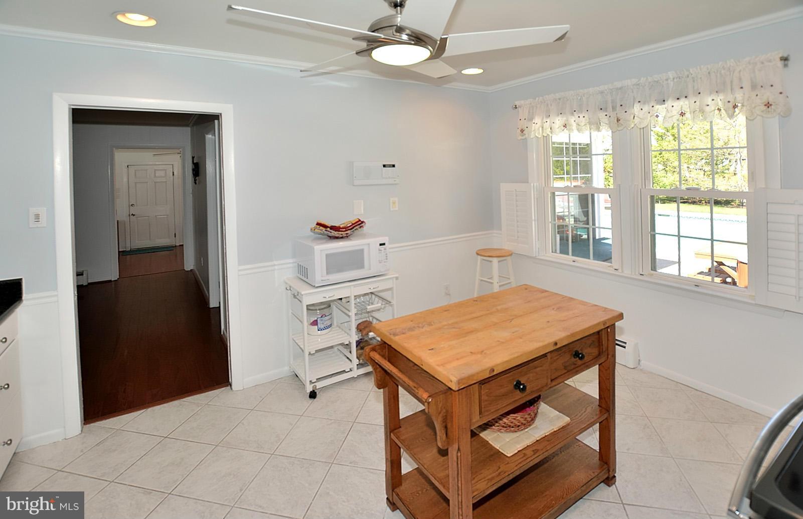 4902 Pole Road Alexandria, VA 22309 - Photo 9 of 30 a room with table and window
