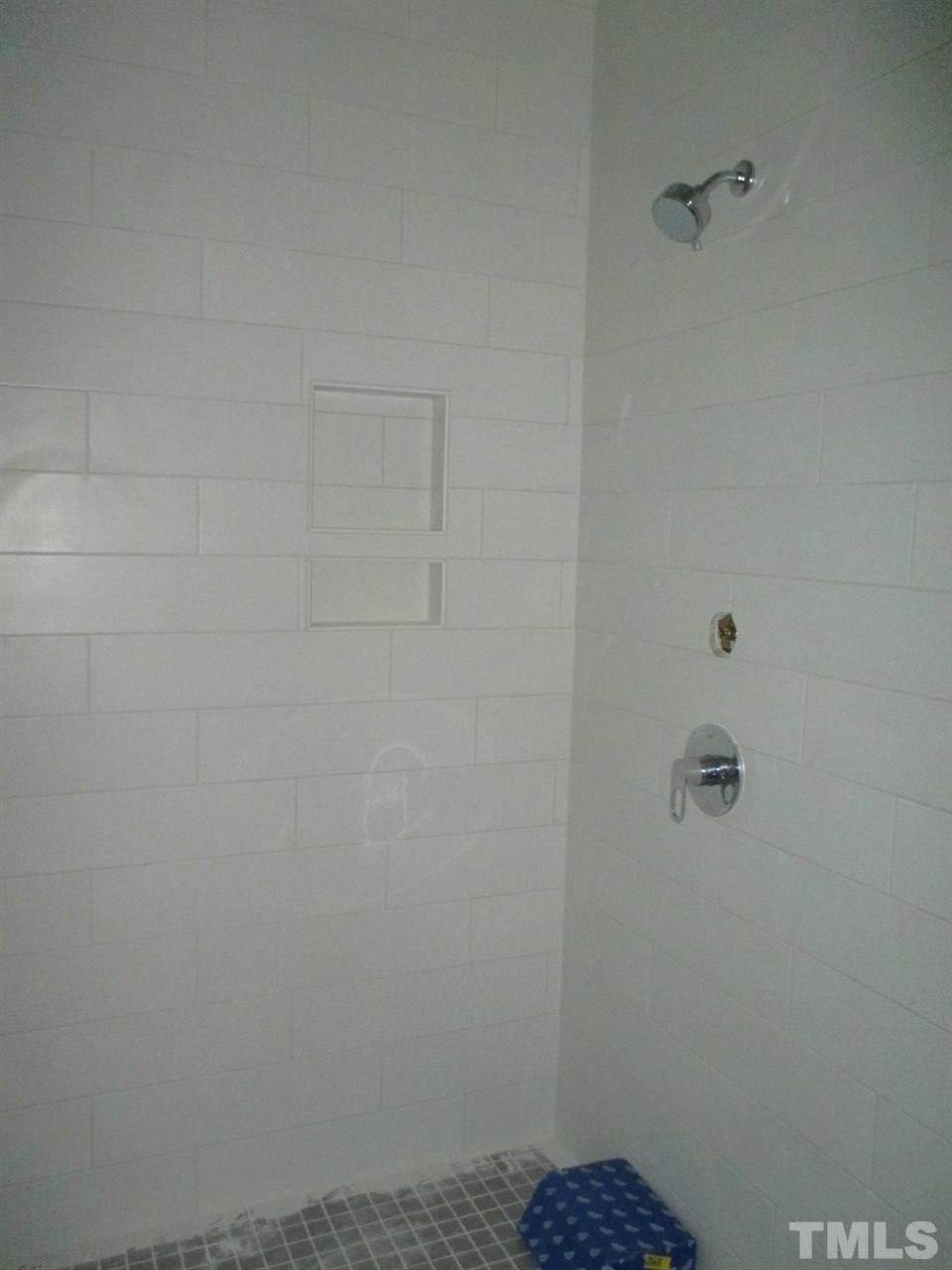 1104 Watauga Street Raleigh, NC 27604 - Photo 7 of 14 a bathroom with a shower
