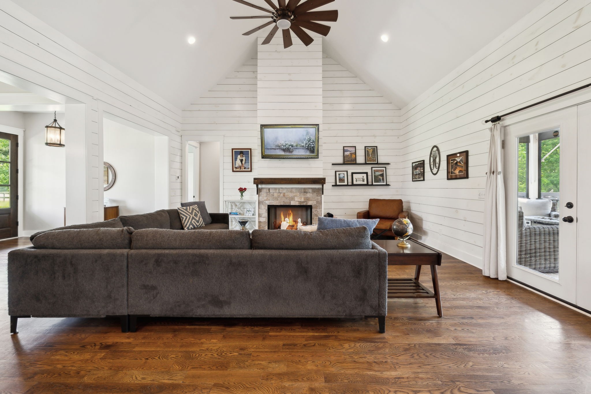 273 Halltown Road Cottontown, TN 37048 - Photo 12 of 65 a living room with furniture and a fireplace