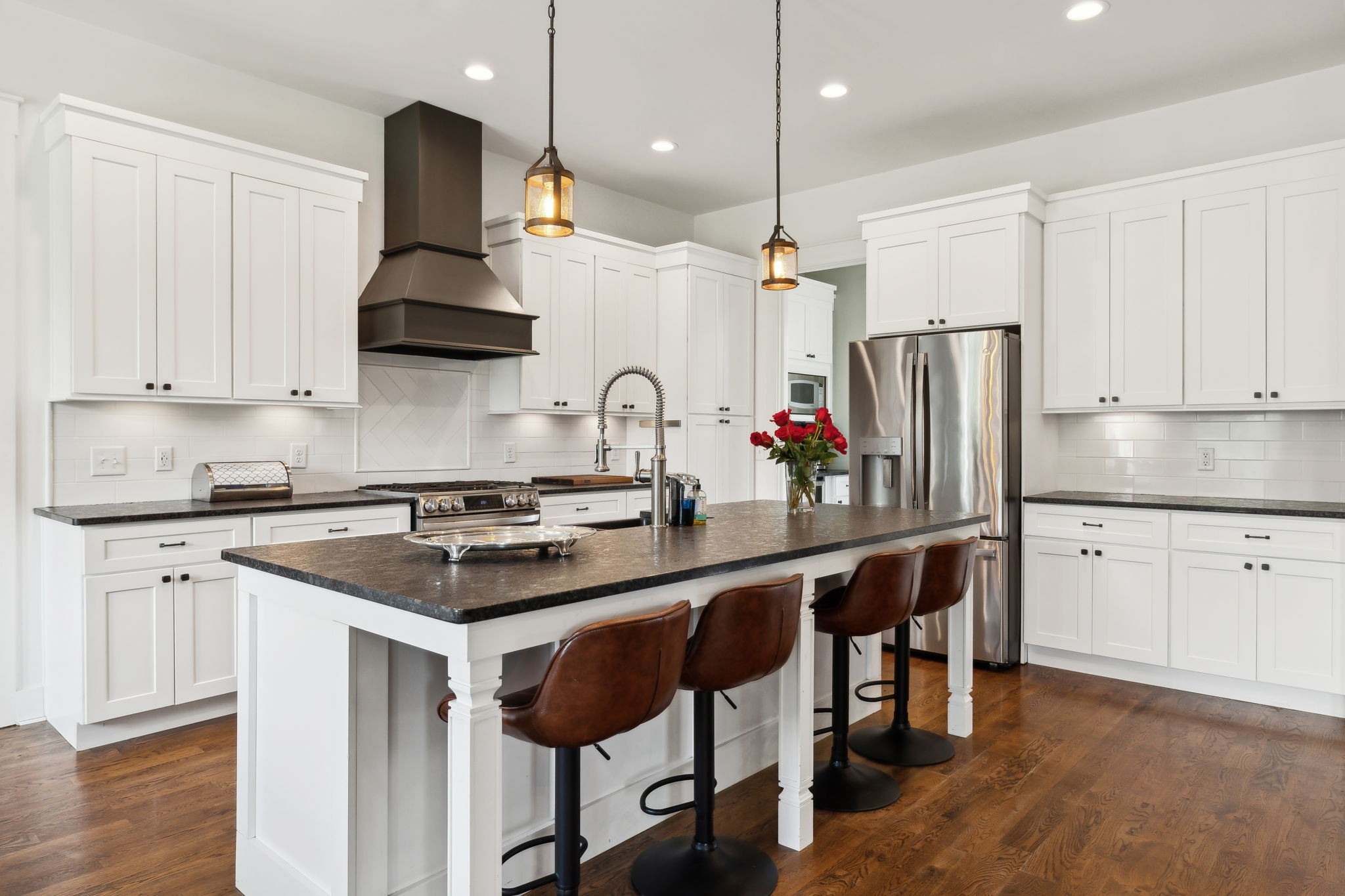 273 Halltown Road Cottontown, TN 37048 - Photo 15 of 65 a kitchen with stainless steel appliances granite countertop a sink a stove and a refrigerator
