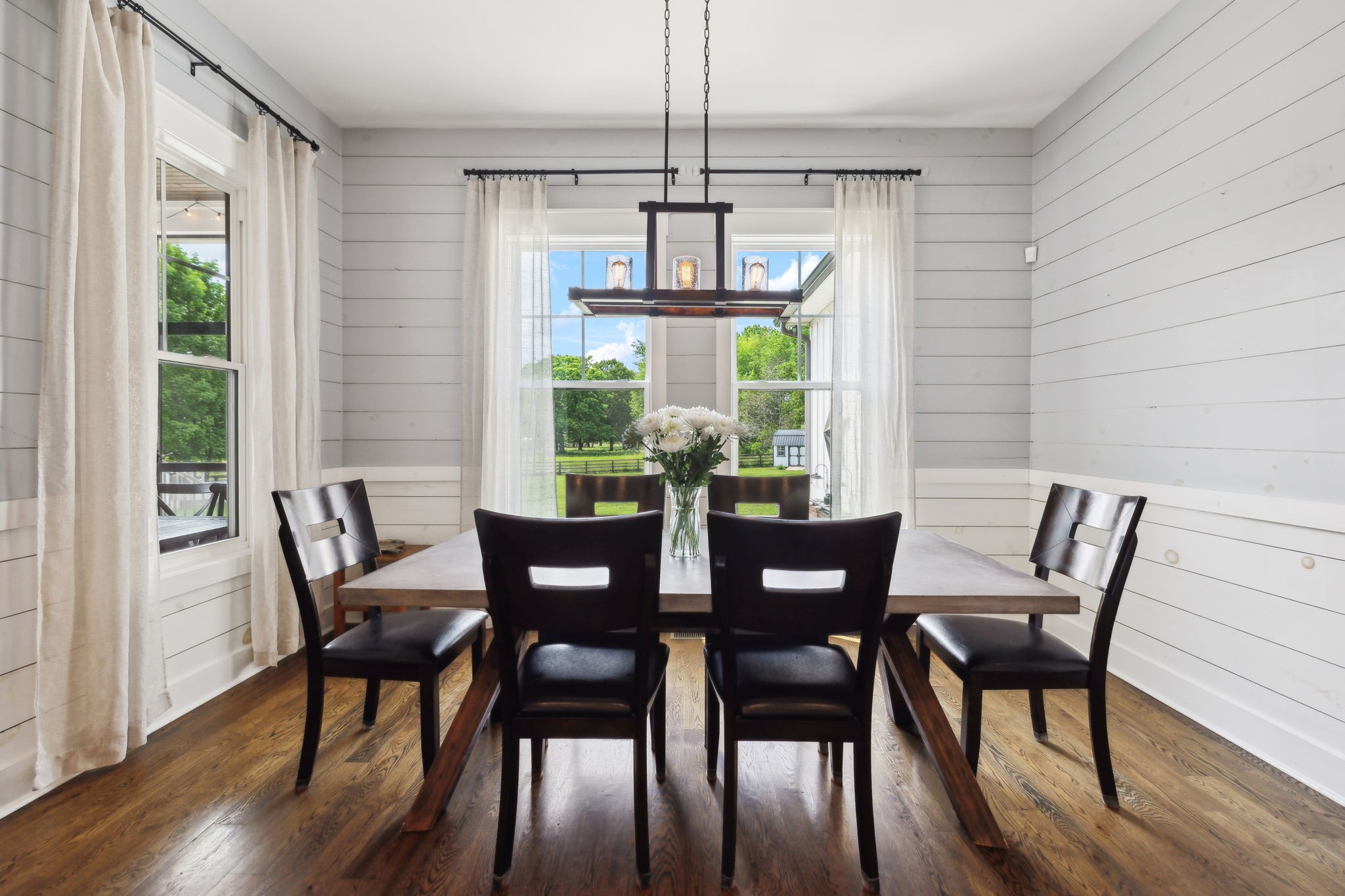 273 Halltown Road Cottontown, TN 37048 - Photo 17 of 65 a view of a dining room with furniture window and wooden floor