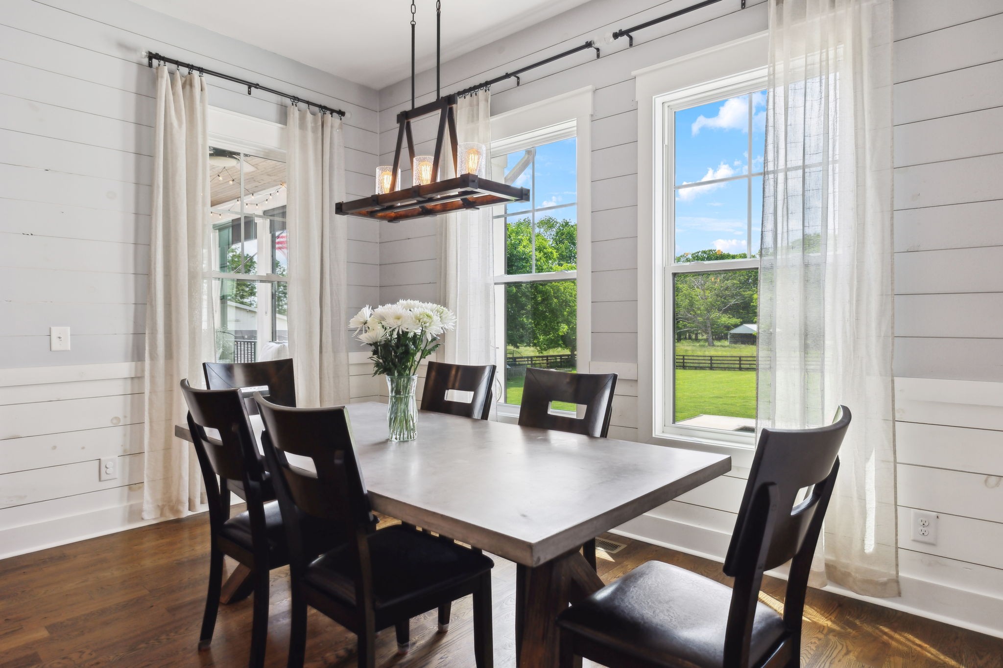 273 Halltown Road Cottontown, TN 37048 - Photo 18 of 65 a view of a dining room with furniture window and wooden floor