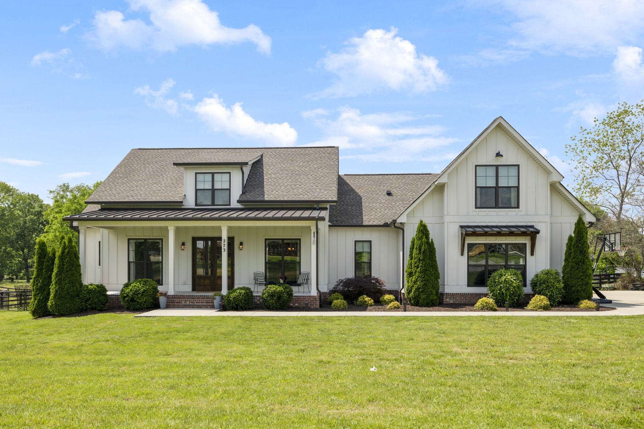 273 Halltown Road Cottontown, TN 37048 - Photo 2 of 65 a front view of a house with a yard