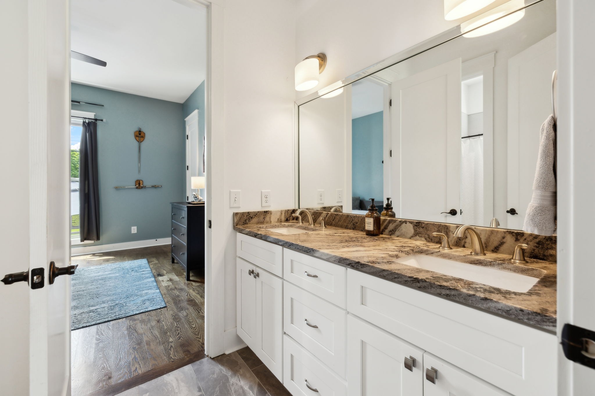 273 Halltown Road Cottontown, TN 37048 - Photo 23 of 65 a bathroom with a granite countertop sink and a mirror