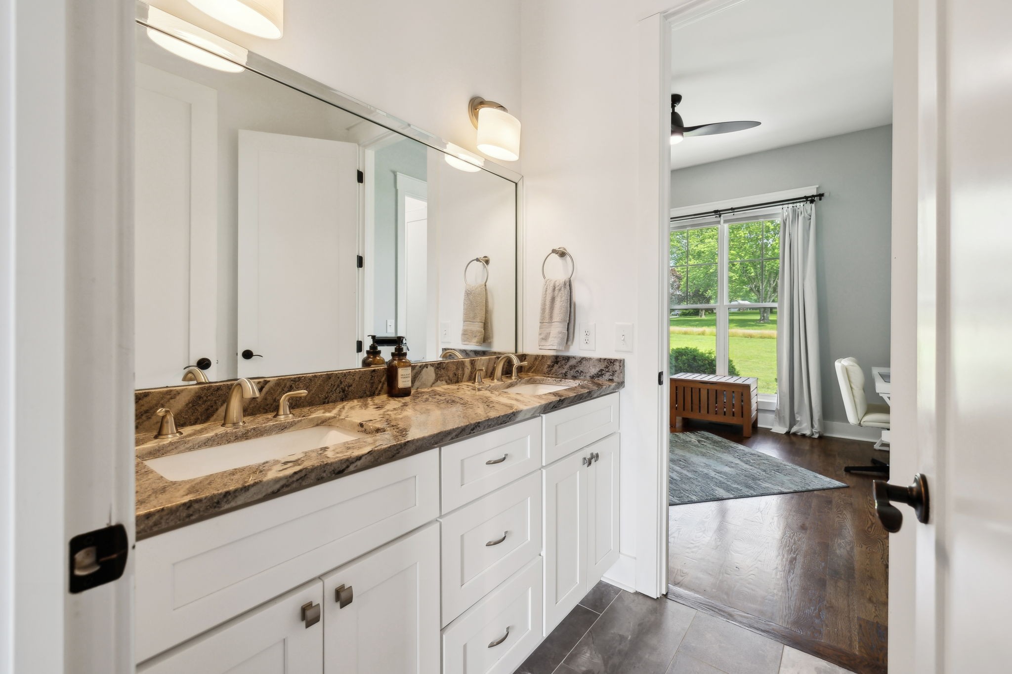 273 Halltown Road Cottontown, TN 37048 - Photo 24 of 65 a bathroom with a granite countertop sink and a mirror
