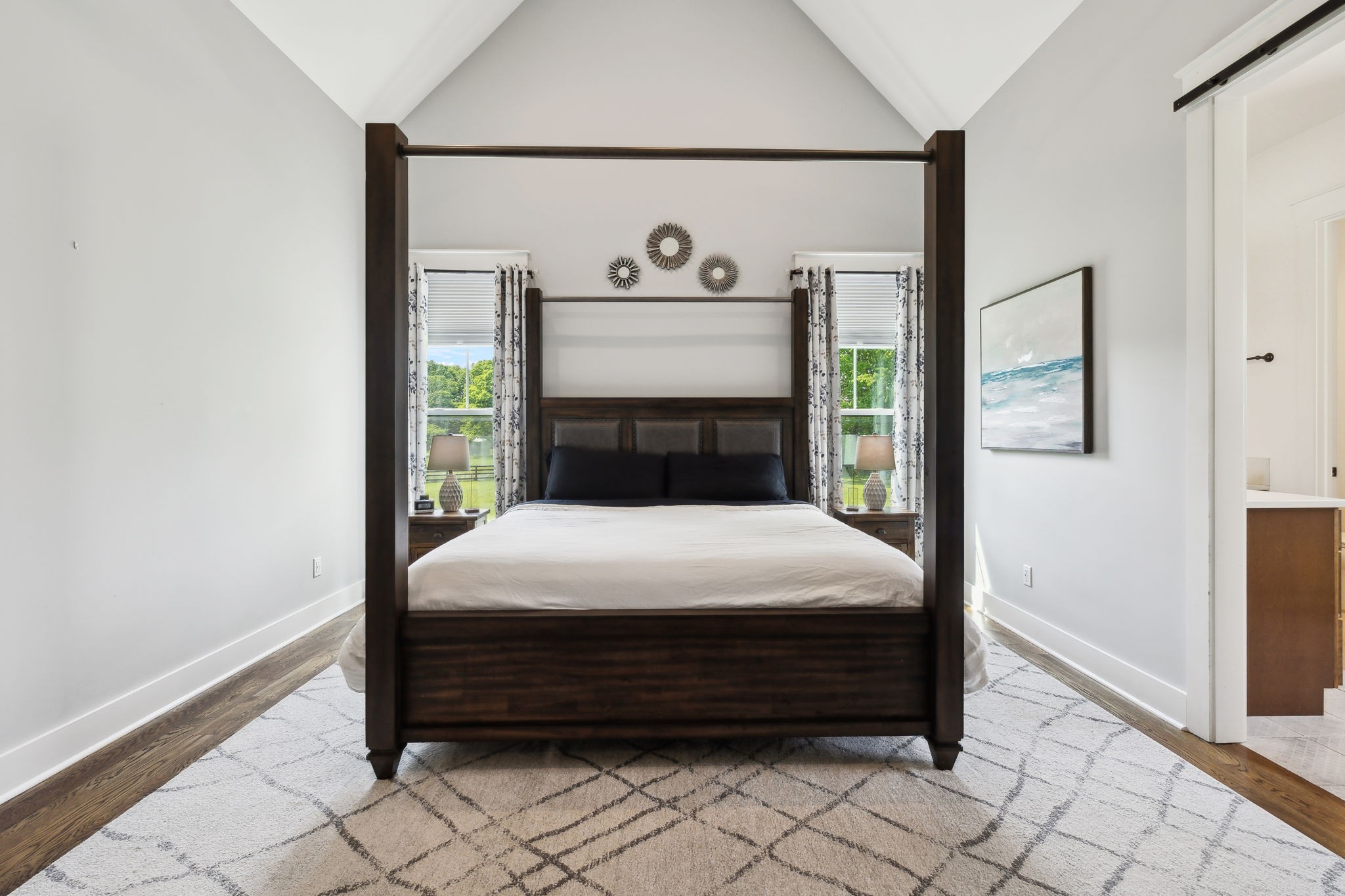 273 Halltown Road Cottontown, TN 37048 - Photo 33 of 65 a bed sitting in a bedroom next to a window