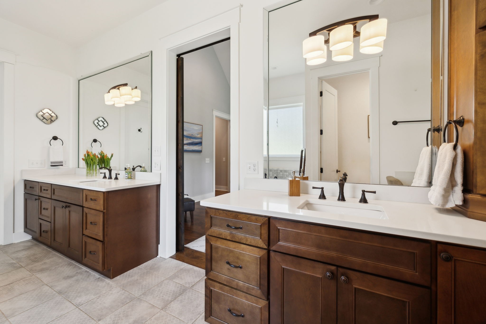 273 Halltown Road Cottontown, TN 37048 - Photo 37 of 65 a bathroom with a double vanity sink and a mirror
