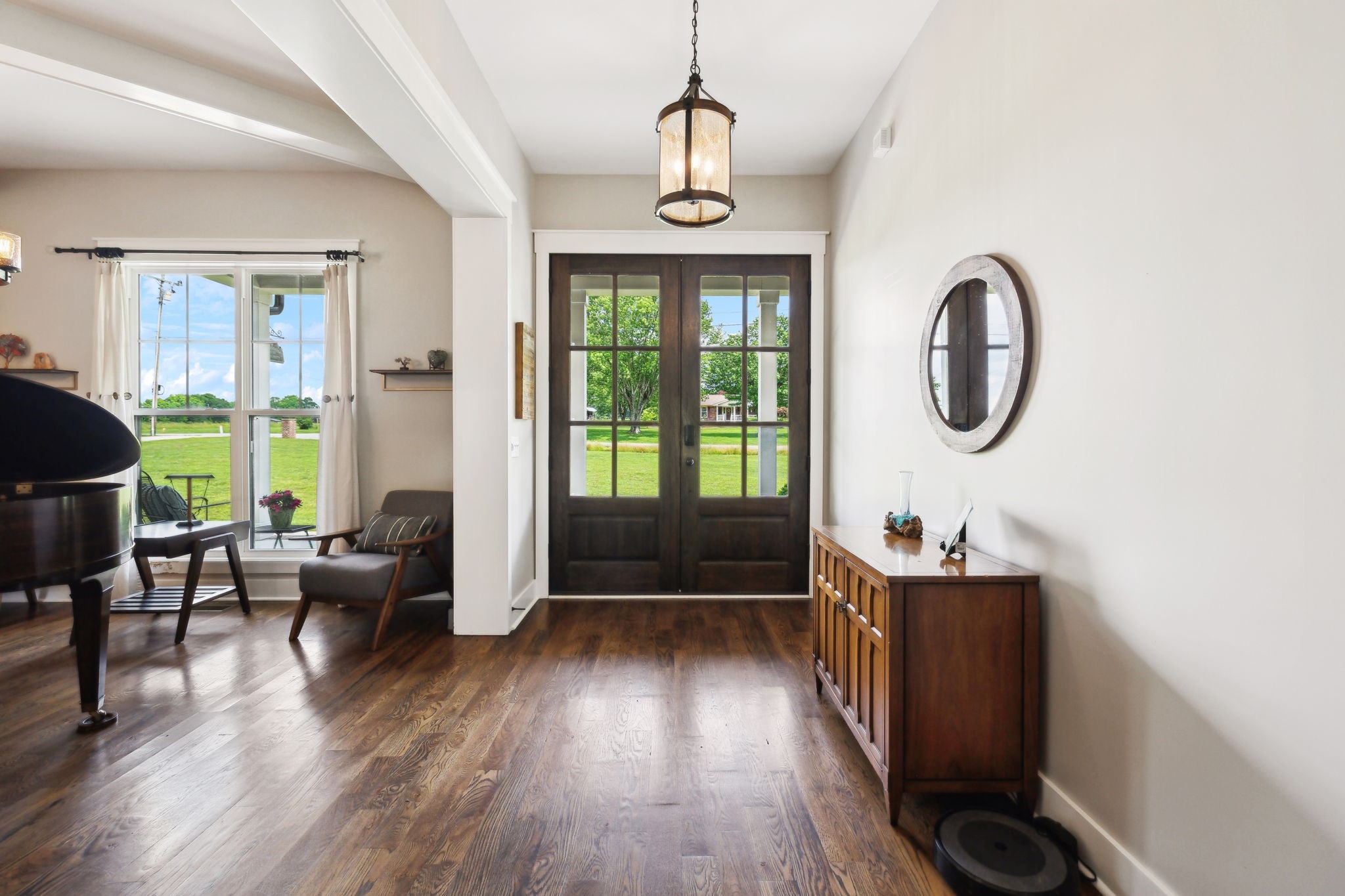 273 Halltown Road Cottontown, TN 37048 - Photo 4 of 65 a view of a livingroom with furniture window wooden floor and front door
