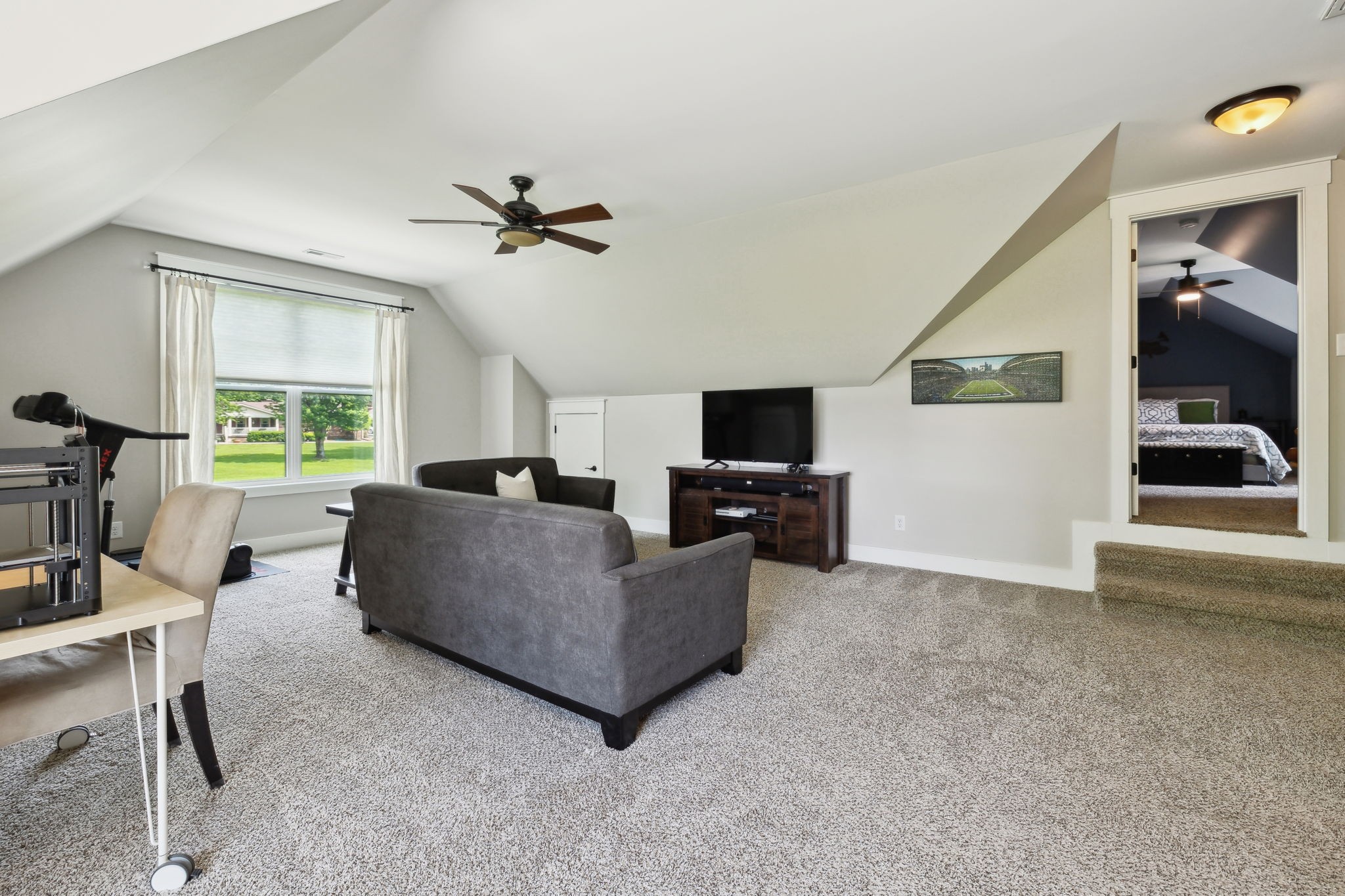 273 Halltown Road Cottontown, TN 37048 - Photo 42 of 65 a living room with furniture and a flat screen tv
