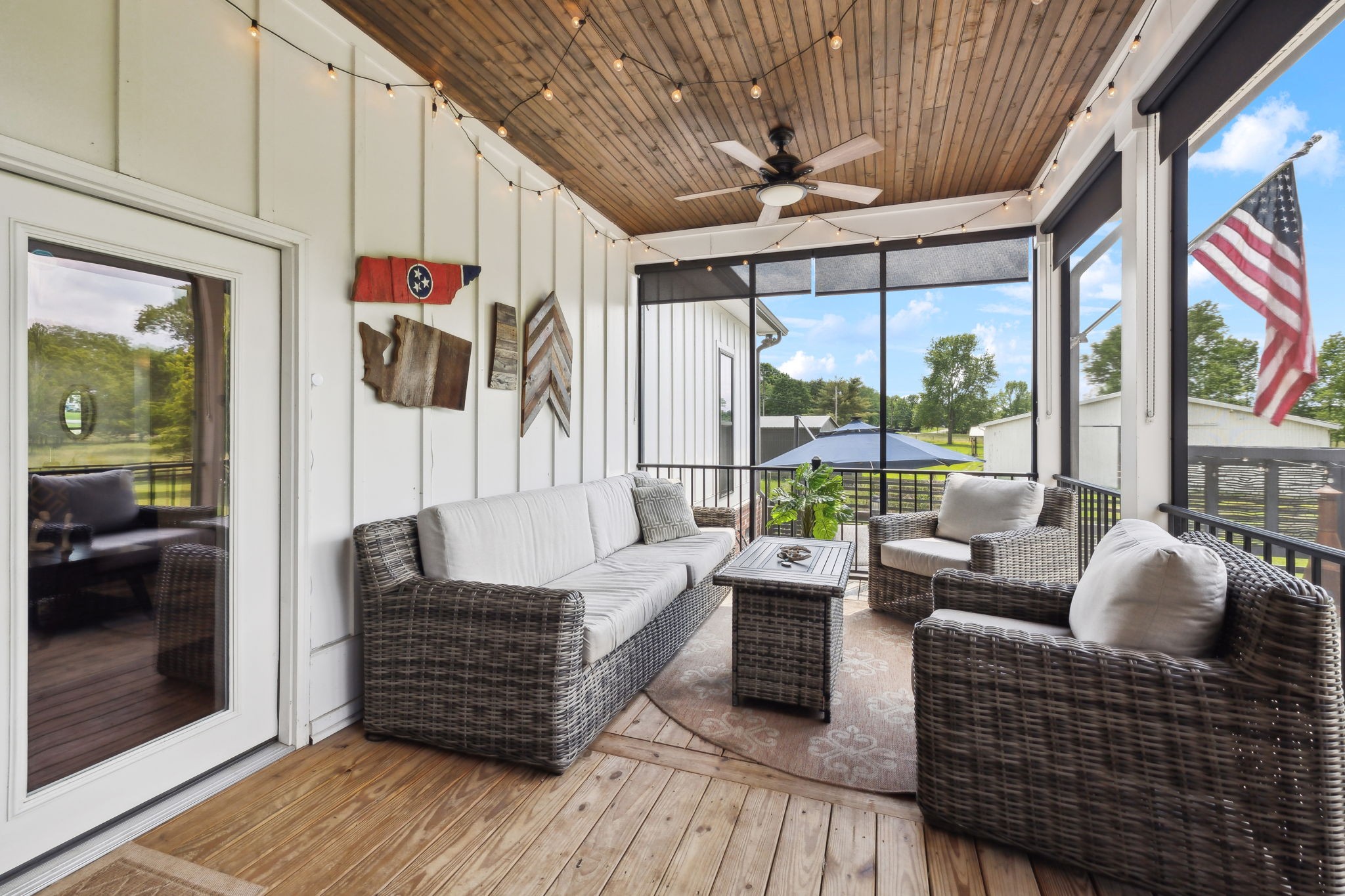 273 Halltown Road Cottontown, TN 37048 - Photo 51 of 65 a living room with furniture and a floor to ceiling window