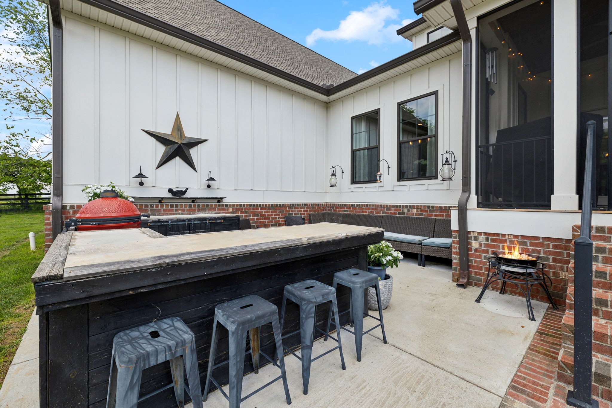 273 Halltown Road Cottontown, TN 37048 - Photo 52 of 65 a backyard of a house with table and chairs