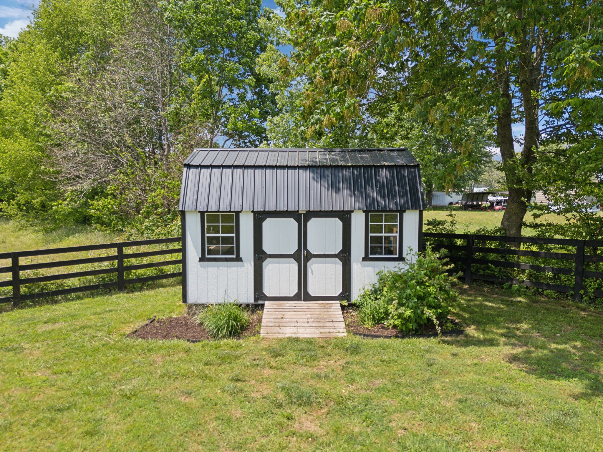 273 Halltown Road Cottontown, TN 37048 - Photo 61 of 65 a front view of a house with garden