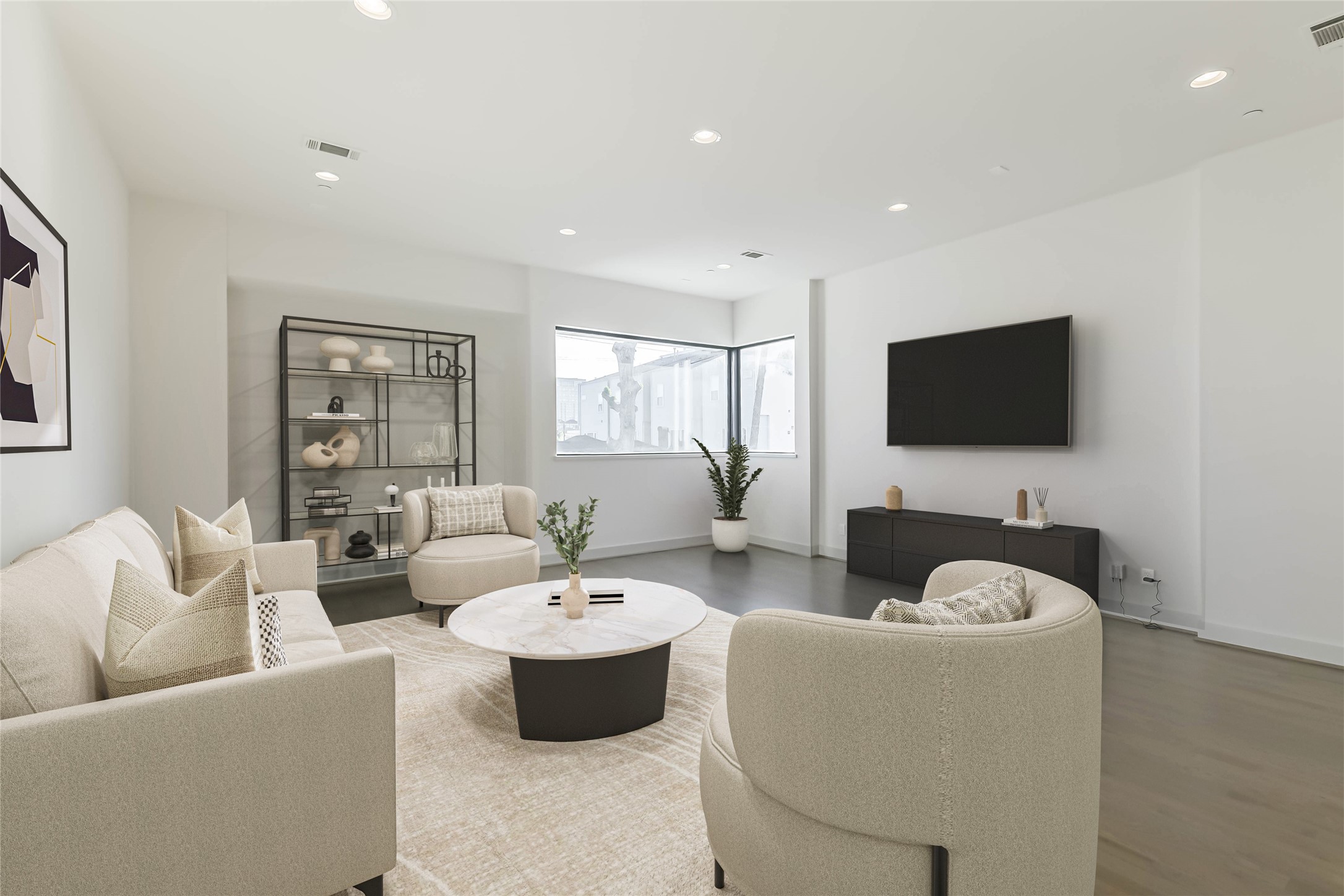 1509 Ruth Street Houston, TX 77004 - Photo 8 of 33 a living room with furniture and a flat screen tv
