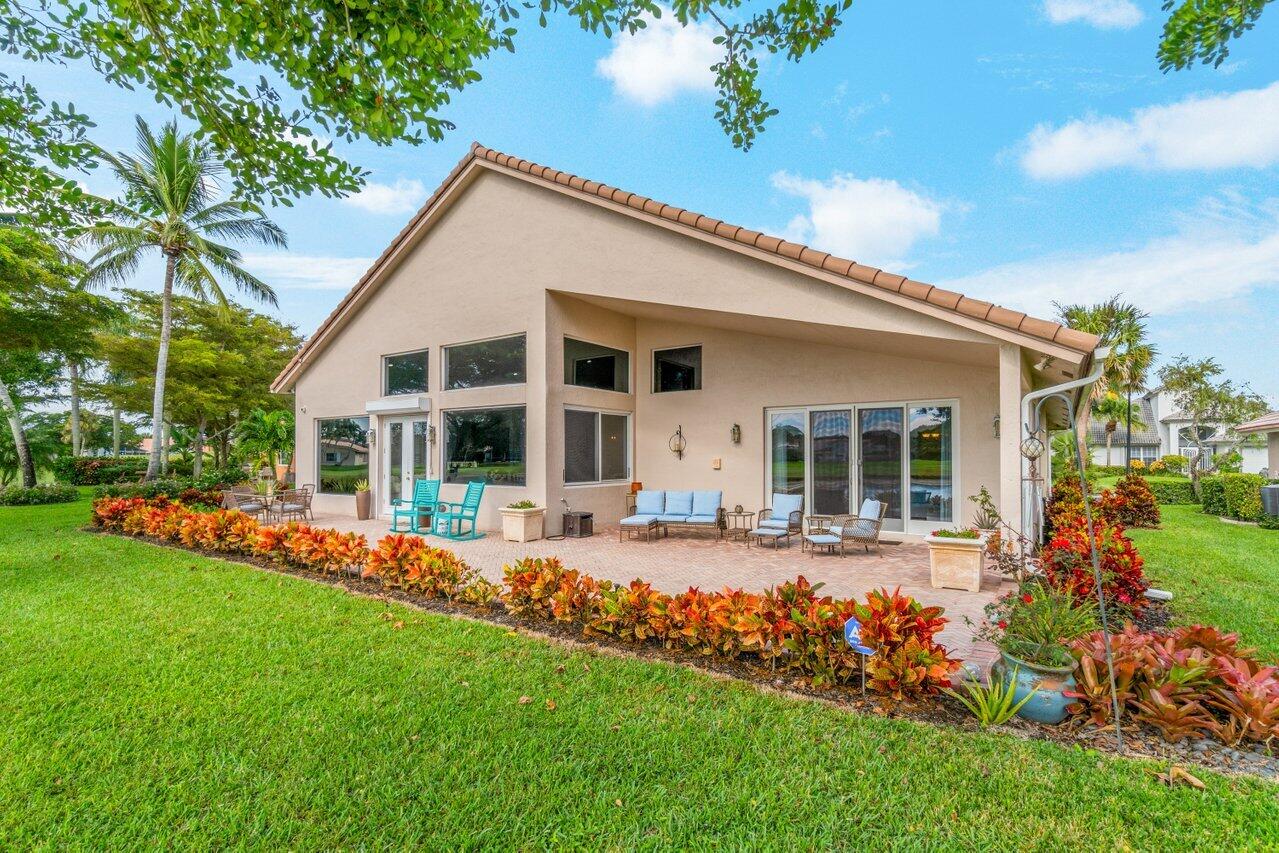 6934 Grenelefe Road Boynton Beach, FL 33437 - Photo 34 of 57 Rear Patio and Yard