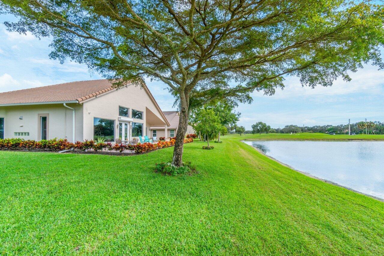 6934 Grenelefe Road Boynton Beach, FL 33437 - Photo 37 of 57 Rear Patio and Yard