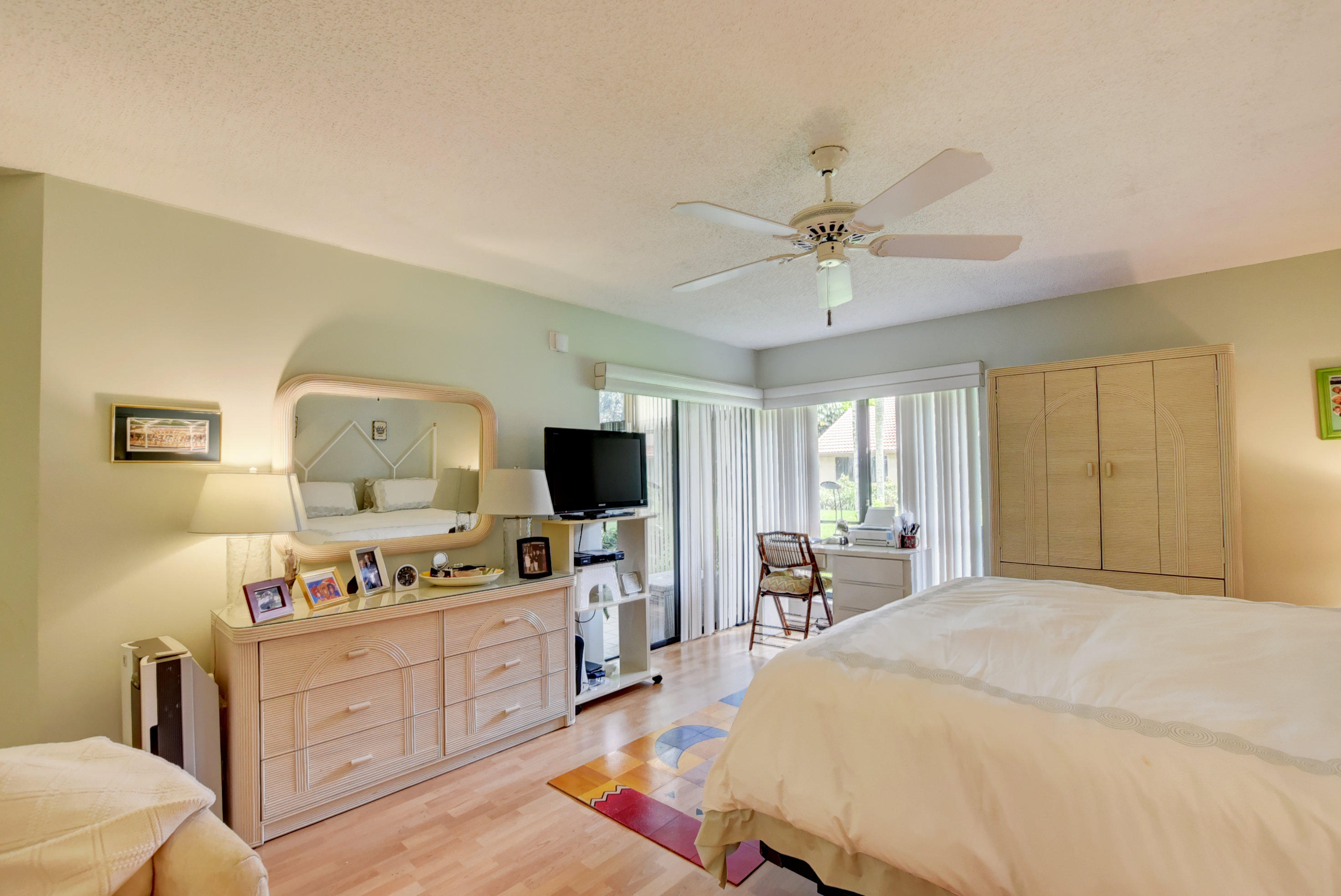 5660 Coach House Circle, Unit A Boca Raton, FL 33486 - Photo 17 of 27 MASTER BEDROOM