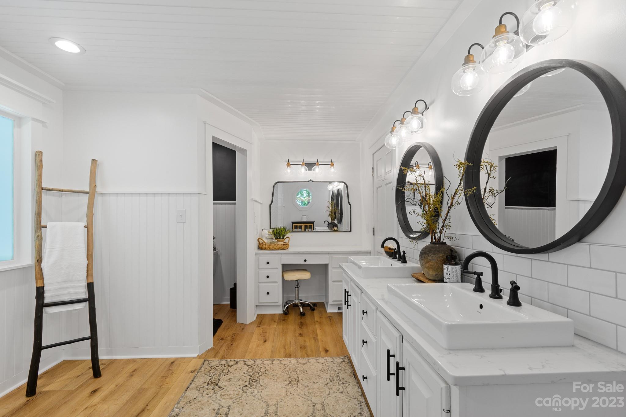 1912 Ruben Road Monroe, NC 28112 - Photo 24 of 45 a bathroom with a sink and a mirror