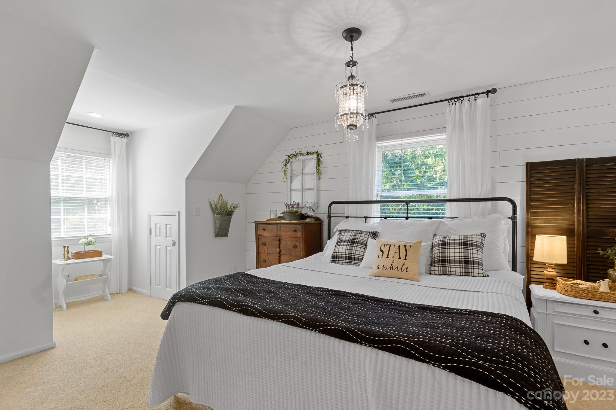 1912 Ruben Road Monroe, NC 28112 - Photo 30 of 45 a bedroom with a large bed and a window