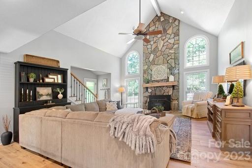 1912 Ruben Road Monroe, NC 28112 - Photo 8 of 45 a bedroom with a bed a fireplace and a large window