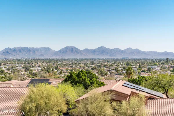 a bathroom with a tub and shower