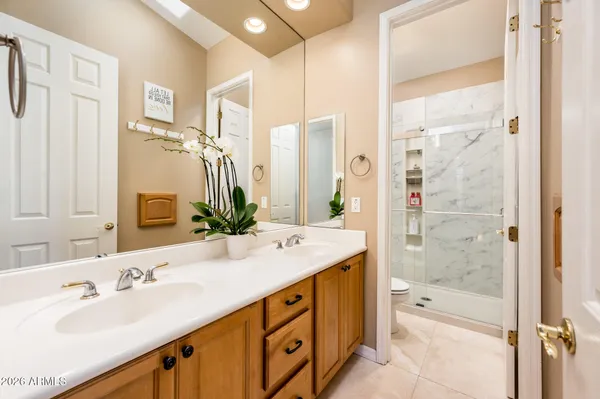 a living room with furniture and windows