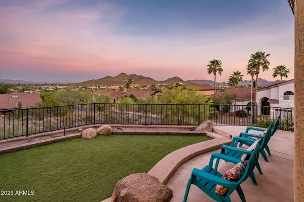 a view of a terrace with sitting area