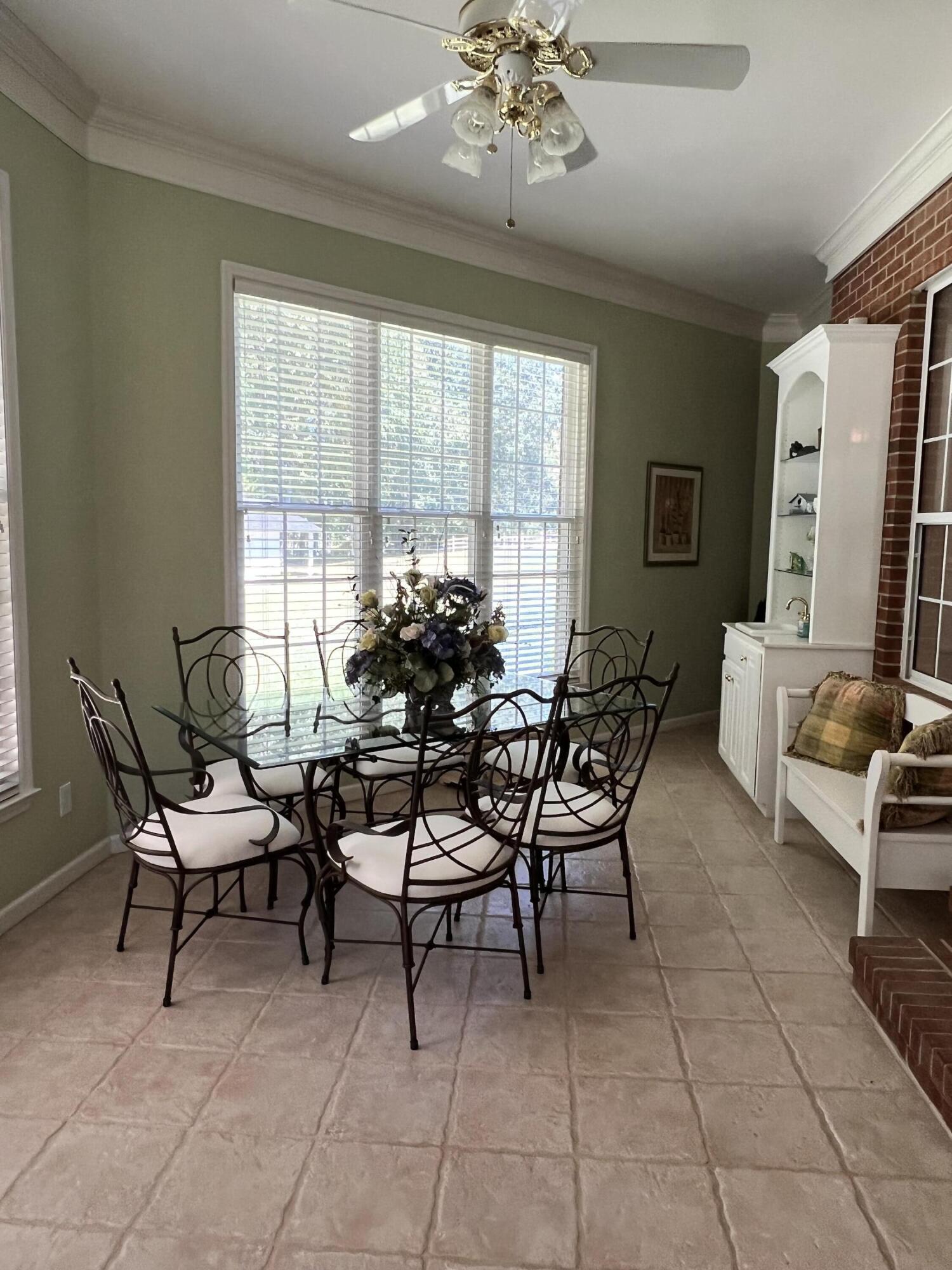 1443 Old Salem Road Thomson, GA 30824 - Photo 22 of 46 Sunroom eating area