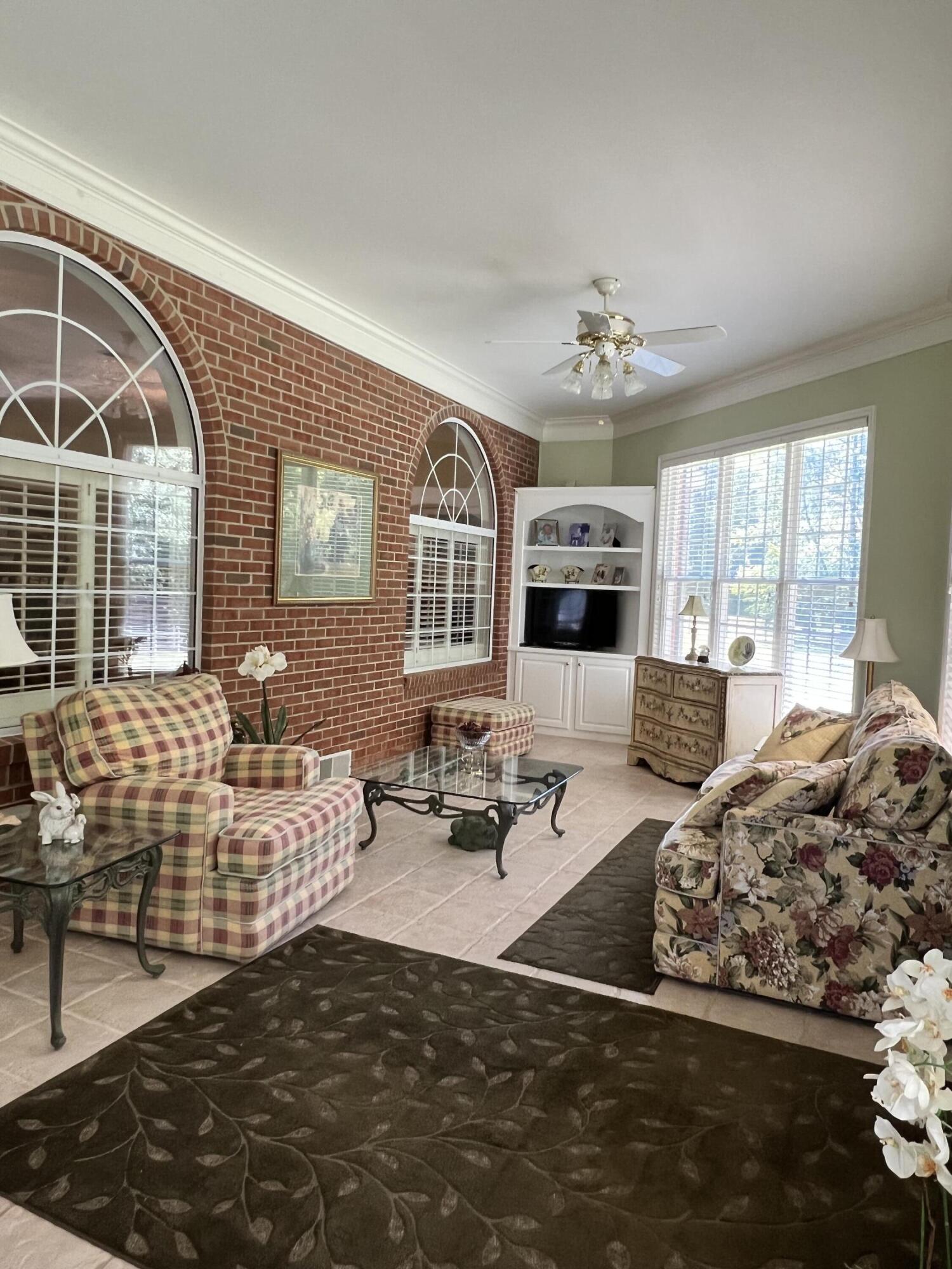 1443 Old Salem Road Thomson, GA 30824 - Photo 23 of 46 Sunroom sitting area