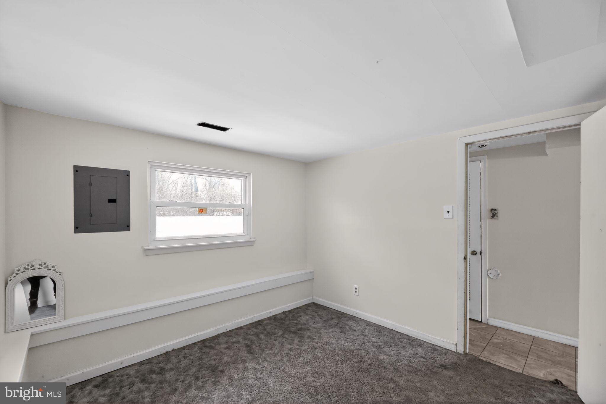 308 Smith Lane Runnemede, NJ 08078 - Photo 21 of 32 a view of an empty room with a window