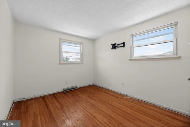 a view of a room that has a window