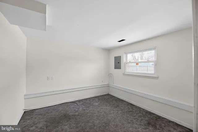 a view of a patio with table and chairs a barbeque with wooden floor and fence
