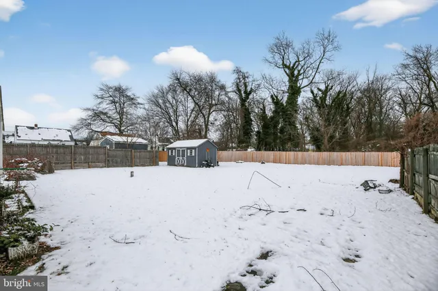a view of a backyard with a snow