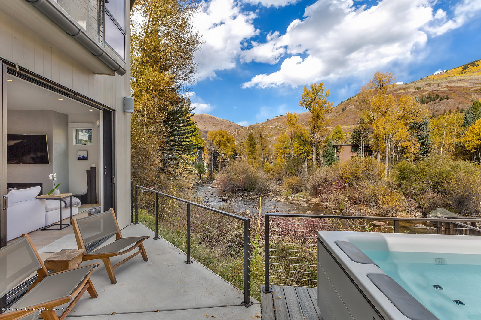 1098 Waters Avenue Aspen, CO 81611 - Photo 13 of 45 a view of a balcony with chairs